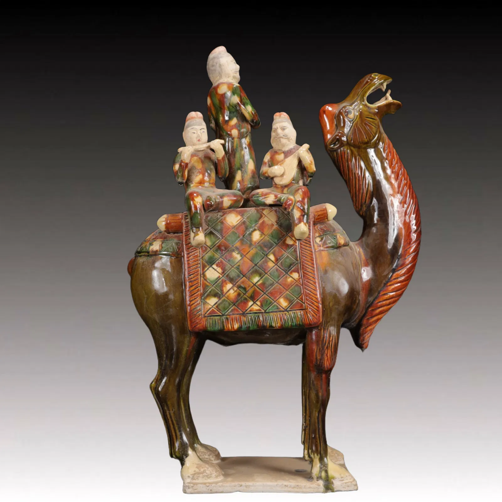 An Rare Tang Tri-Color Glazed Pottery Figure Riding Camel Ornament