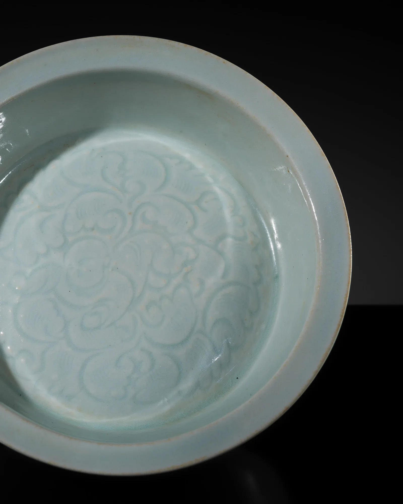 AN UNUSUAL QINGBAI 'BOY' BOWL, SONG-YUAN DYNASTY