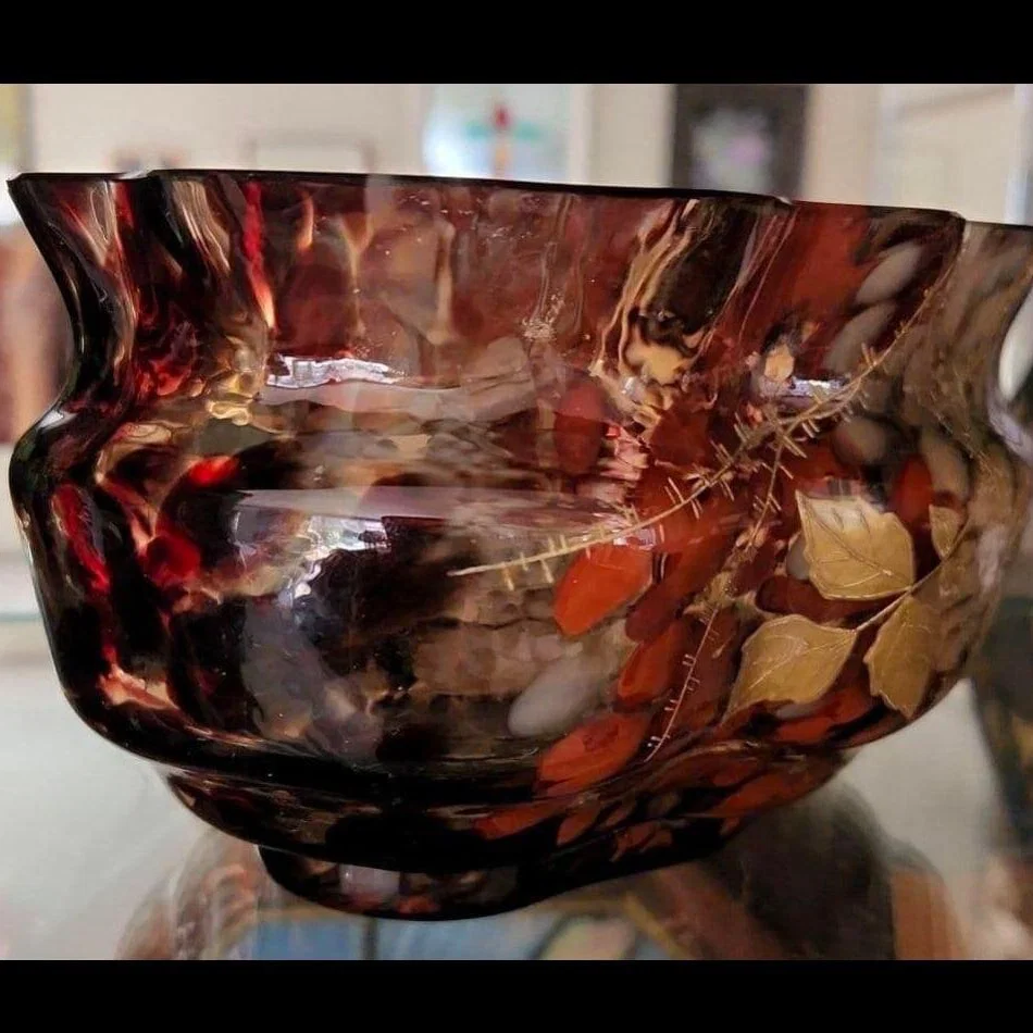 Art Nouveau glass, decorated with a blizzard pattern and gilded rose enamel painting.