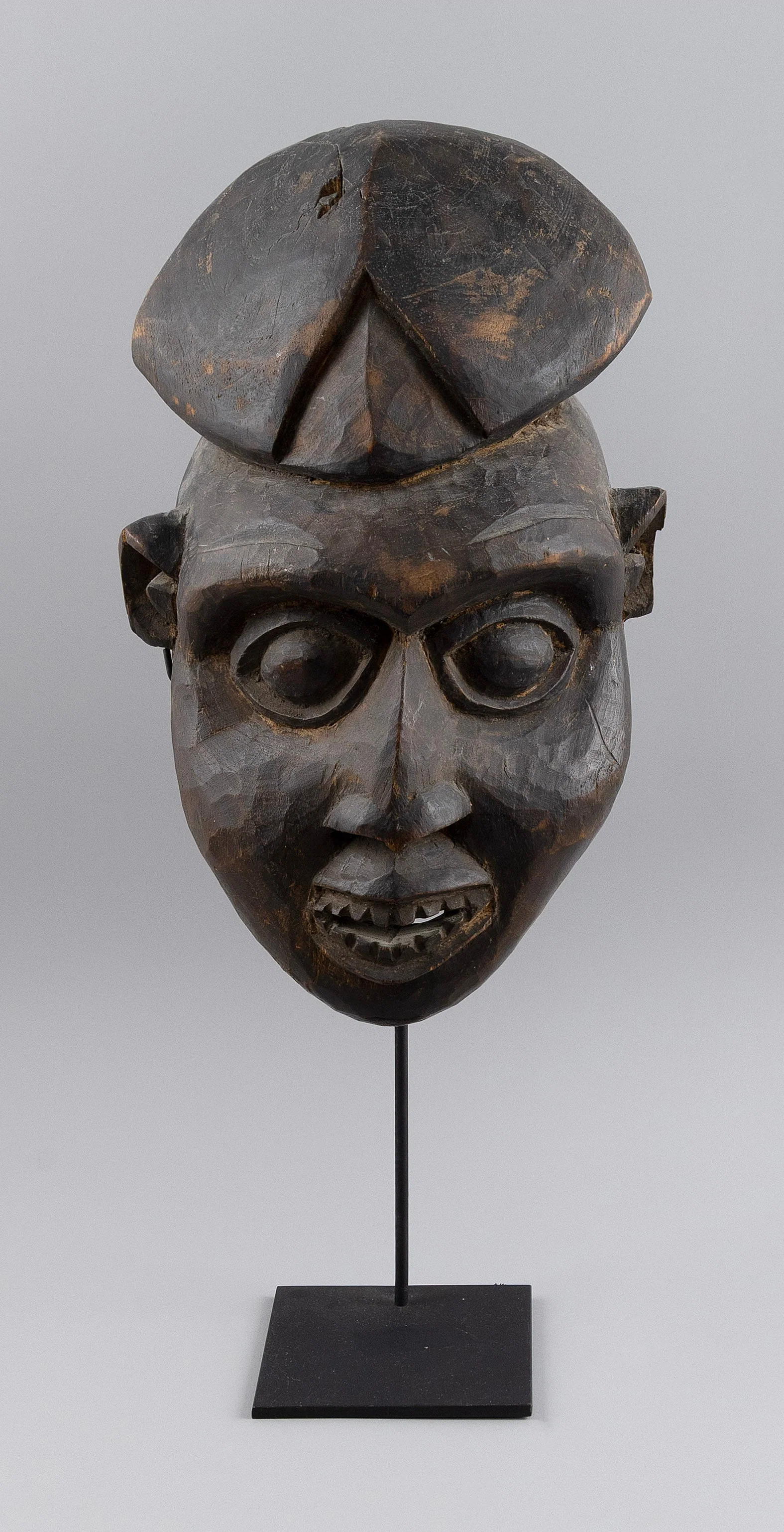 BAMILEKE HELMET MASK Cameroon, 20th Century Height 16". Includes stand.