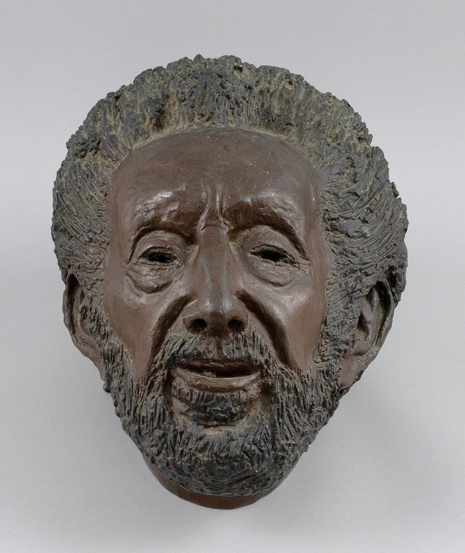 BARBARA BERETICH (California/Illinois/Europe, 1936-2018), Bronze head of a man., Height 11".