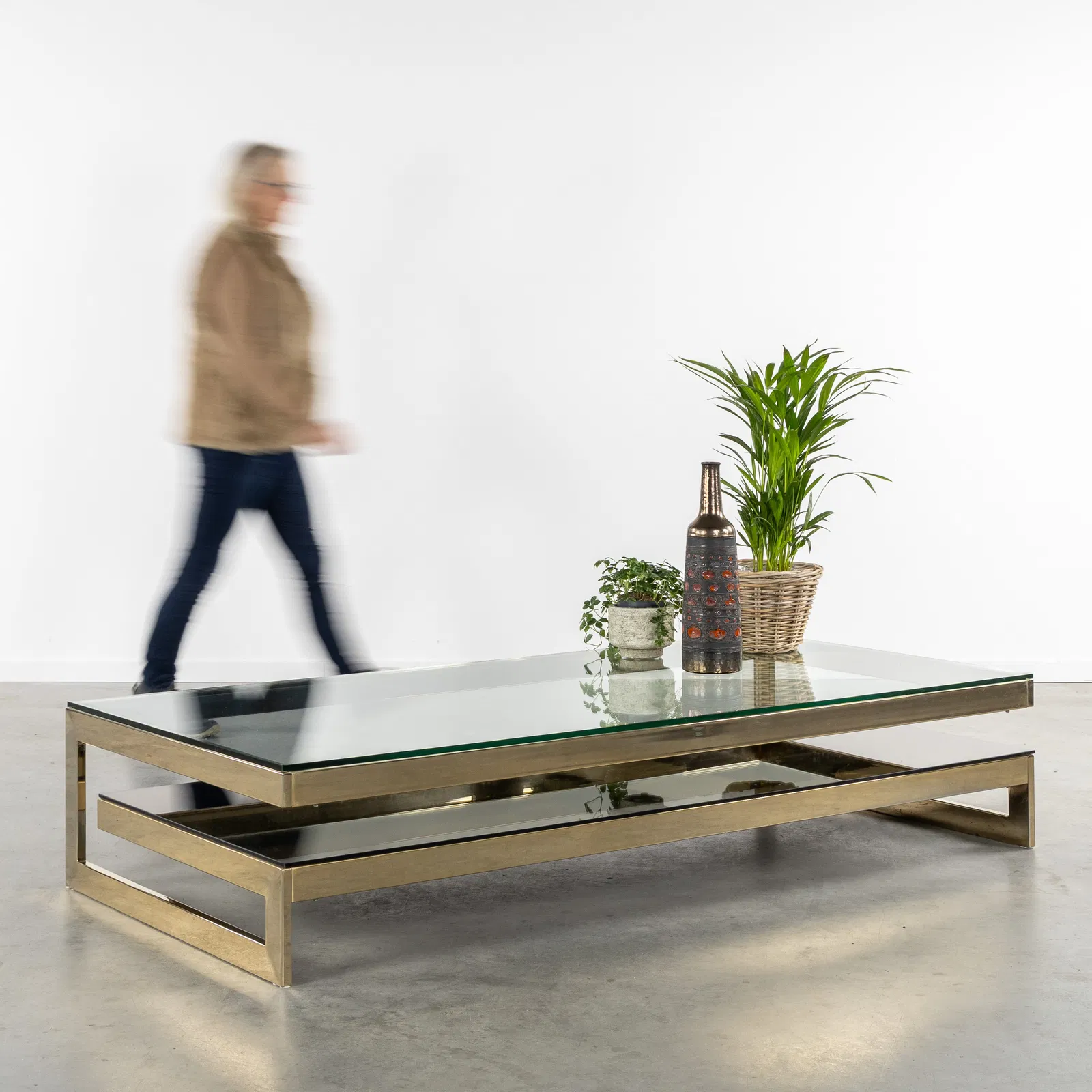 Belgo Chrom, Meutabel, A Large G-shaped Coffee Table. Gilded Metal and Glass. Circa 1970.