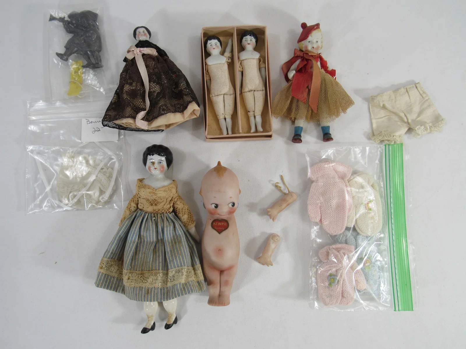 BOX OF CHINA & BISQUE DOLLS: