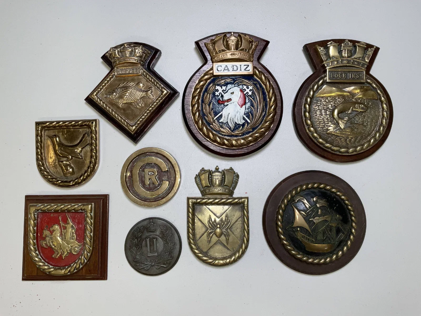 British Royal Navy Gun Tompions and Badges from HMS Warships