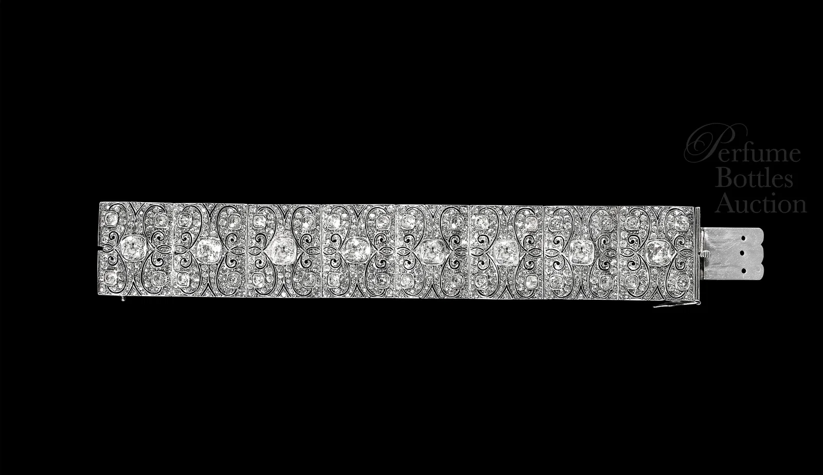 c1930 French Art Deco “Fashion” bracelet, wide hinged panels of elegant scrolled designs