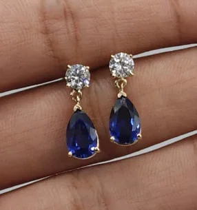 Certified 8.00 Carat Pear Cut Lab Grown Blue Sapphire & 1.40 Ct Round Cut VS1 E Color Lab Grown
