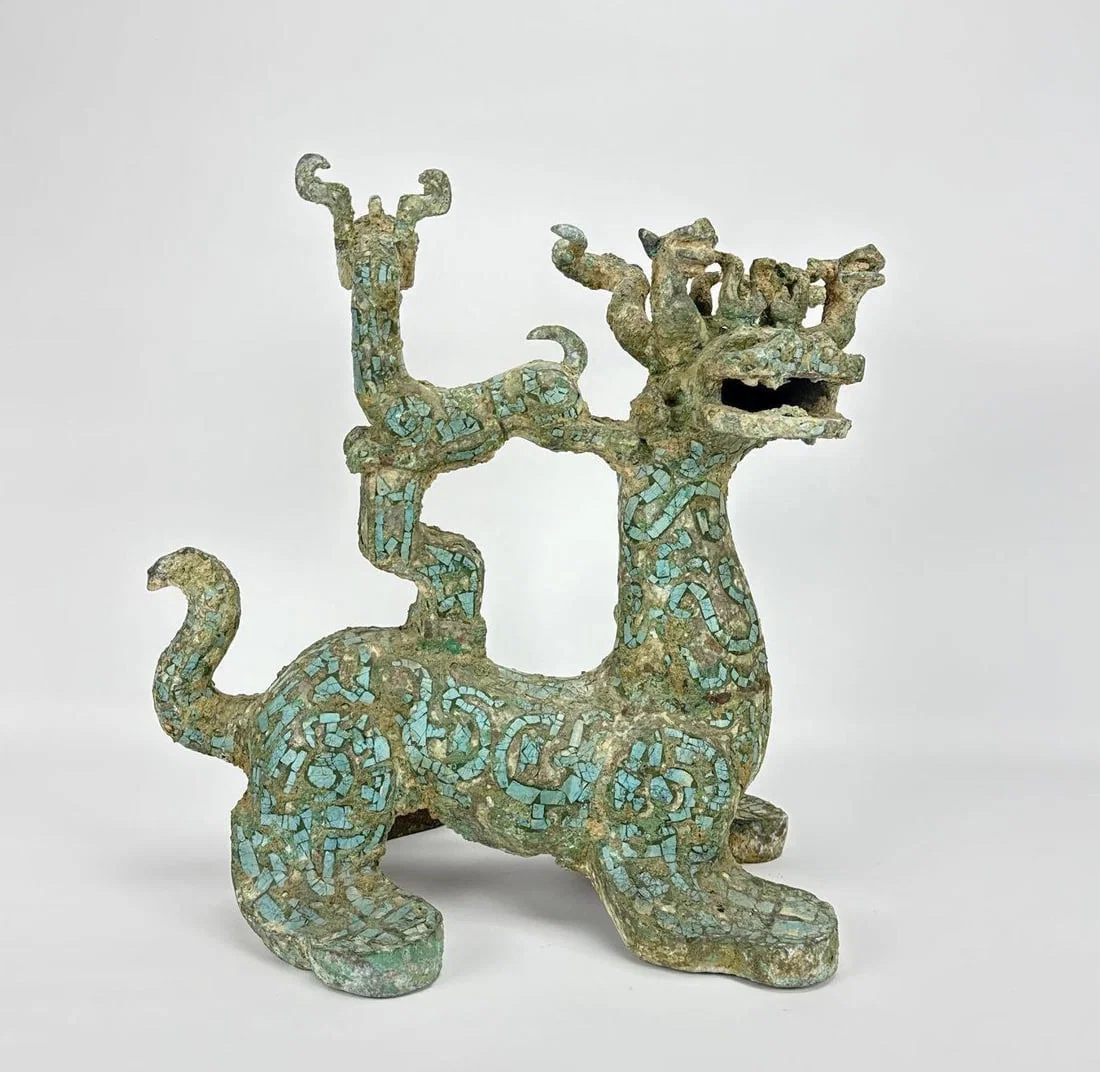 CHINESE ARCHAISTIC BRONZE AND TURQUOISE INSET MYTHICAL QILIN OR PIXIU FIGURES