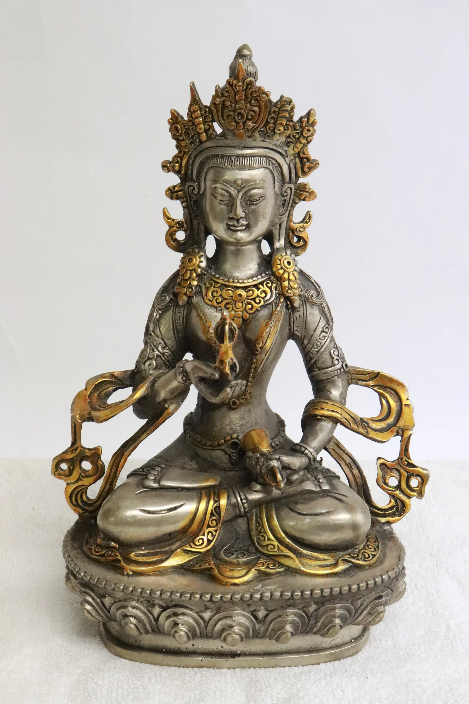 Chinese parcel gilt bronze sculpture of deity