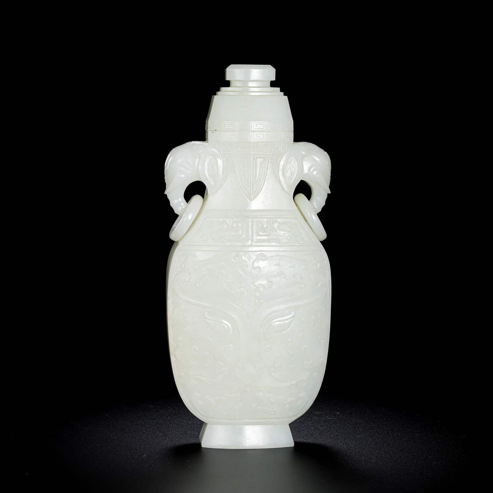 Chinese Qing Dynasty Hetian white jade vase with animal mask design and ring handles