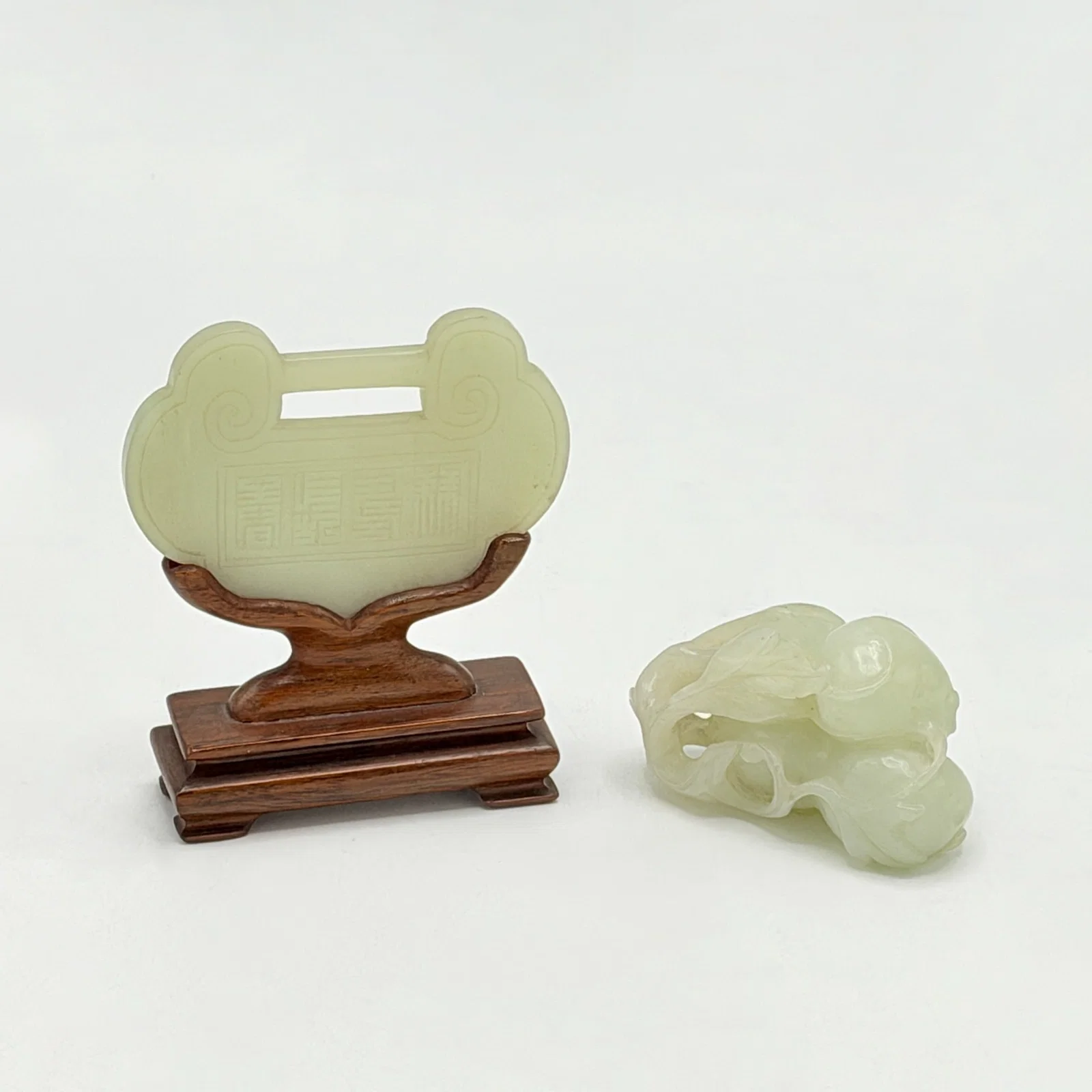 Chinese White Jade Gourds Grouping and White Jade Lock Form Plaque with a Wood Stand