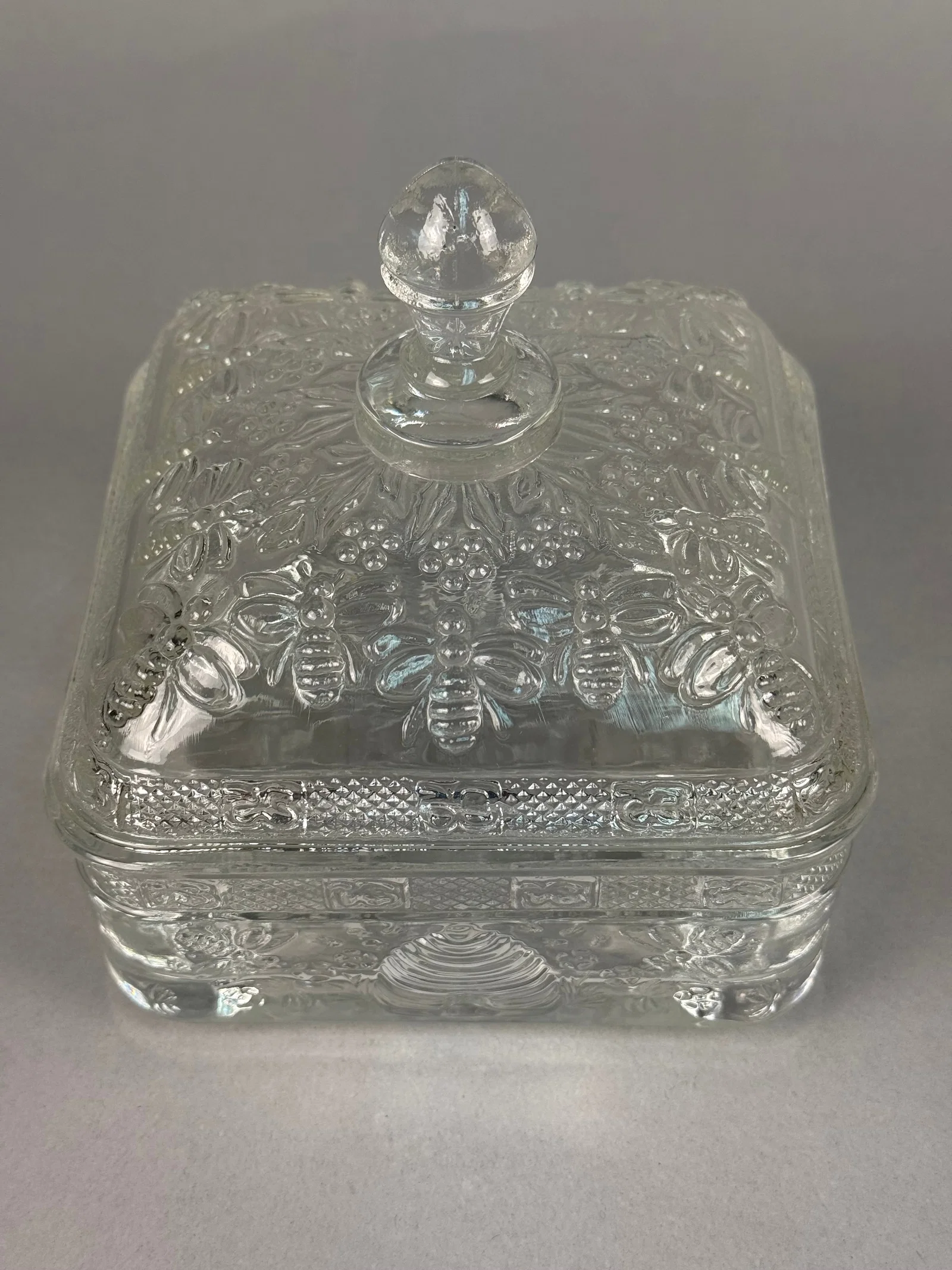 Clear Pressed Glass Footed Lidded Box in the Beehive and Honeybee Pattern