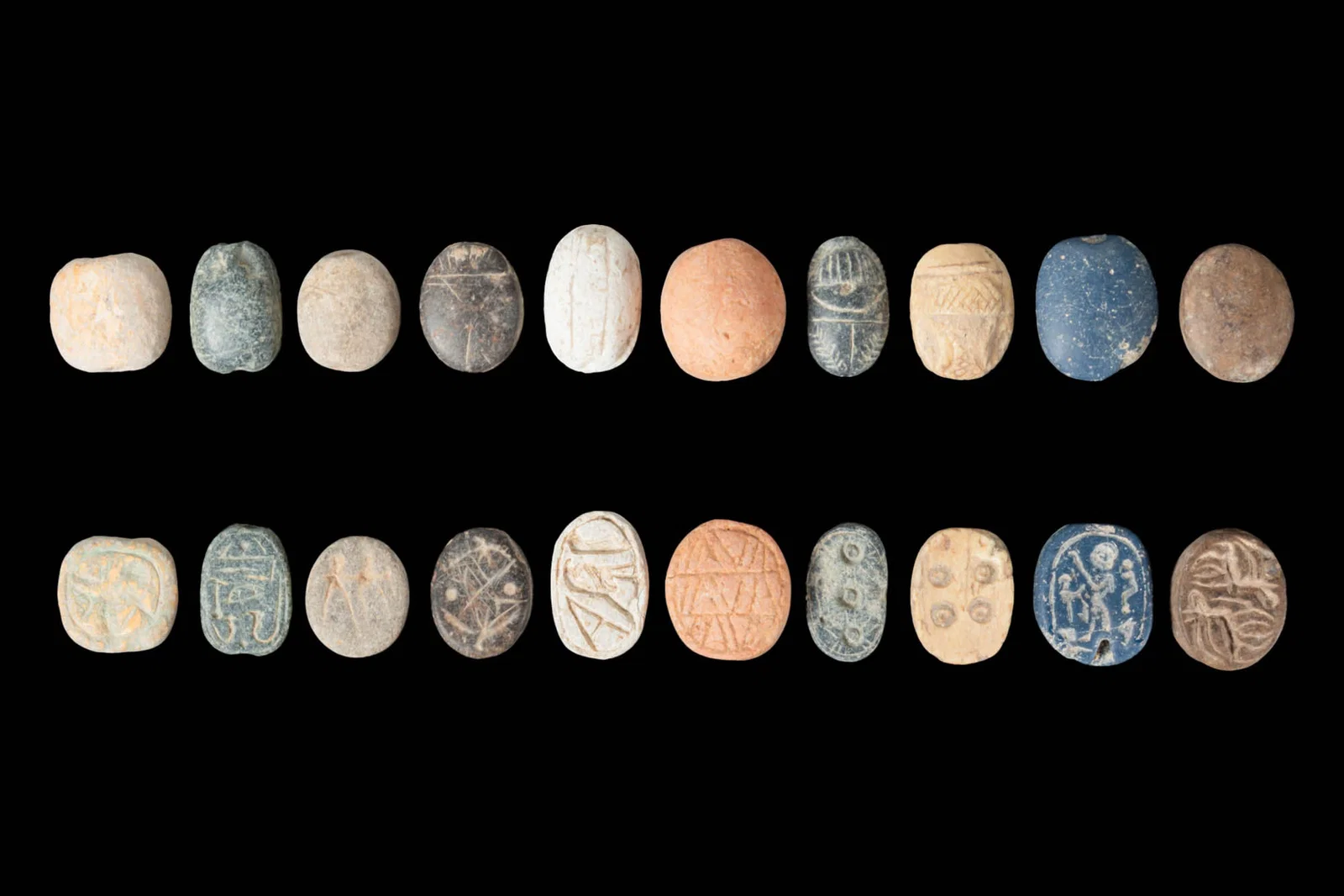 COLLECTION OF EGYPTIAN STONE AND FAIENCE SCARABS