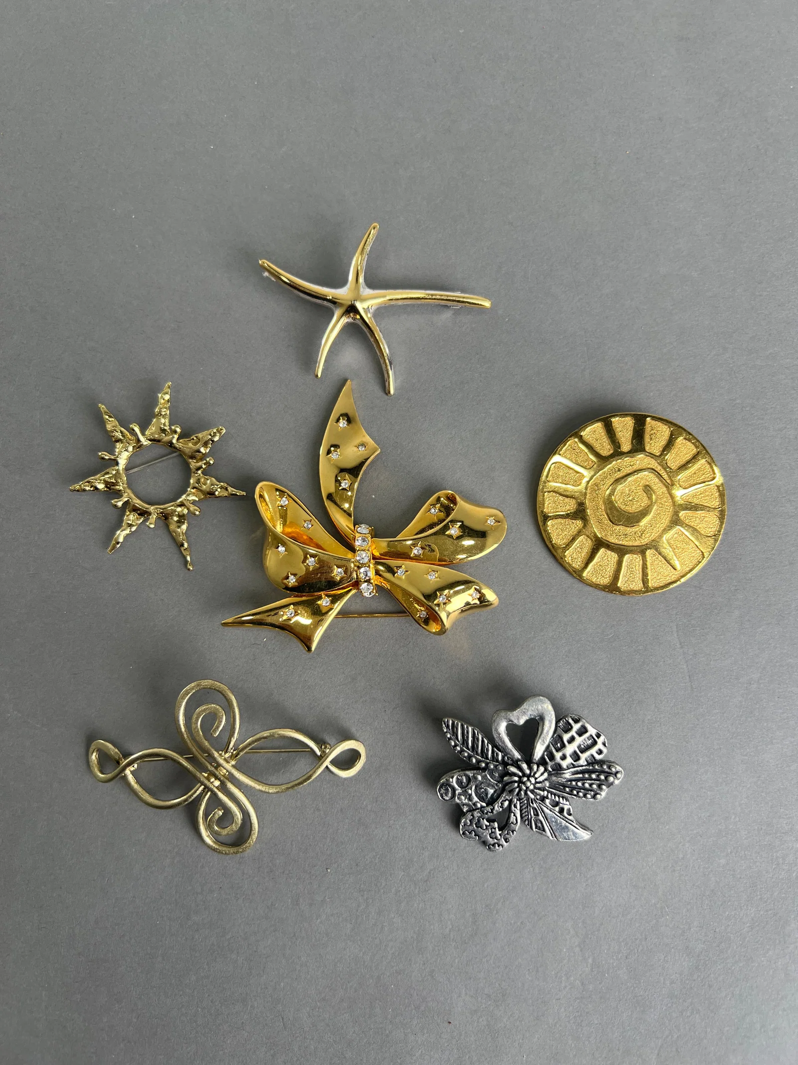 Collection of Six Costume Brooches