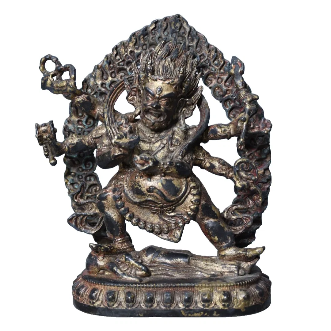 Copper Buddha statue with six arms, Mahakala.