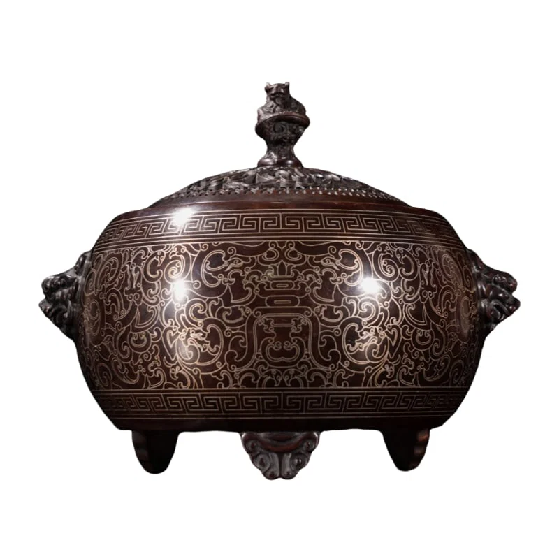 Copper incense burner with silver wire.