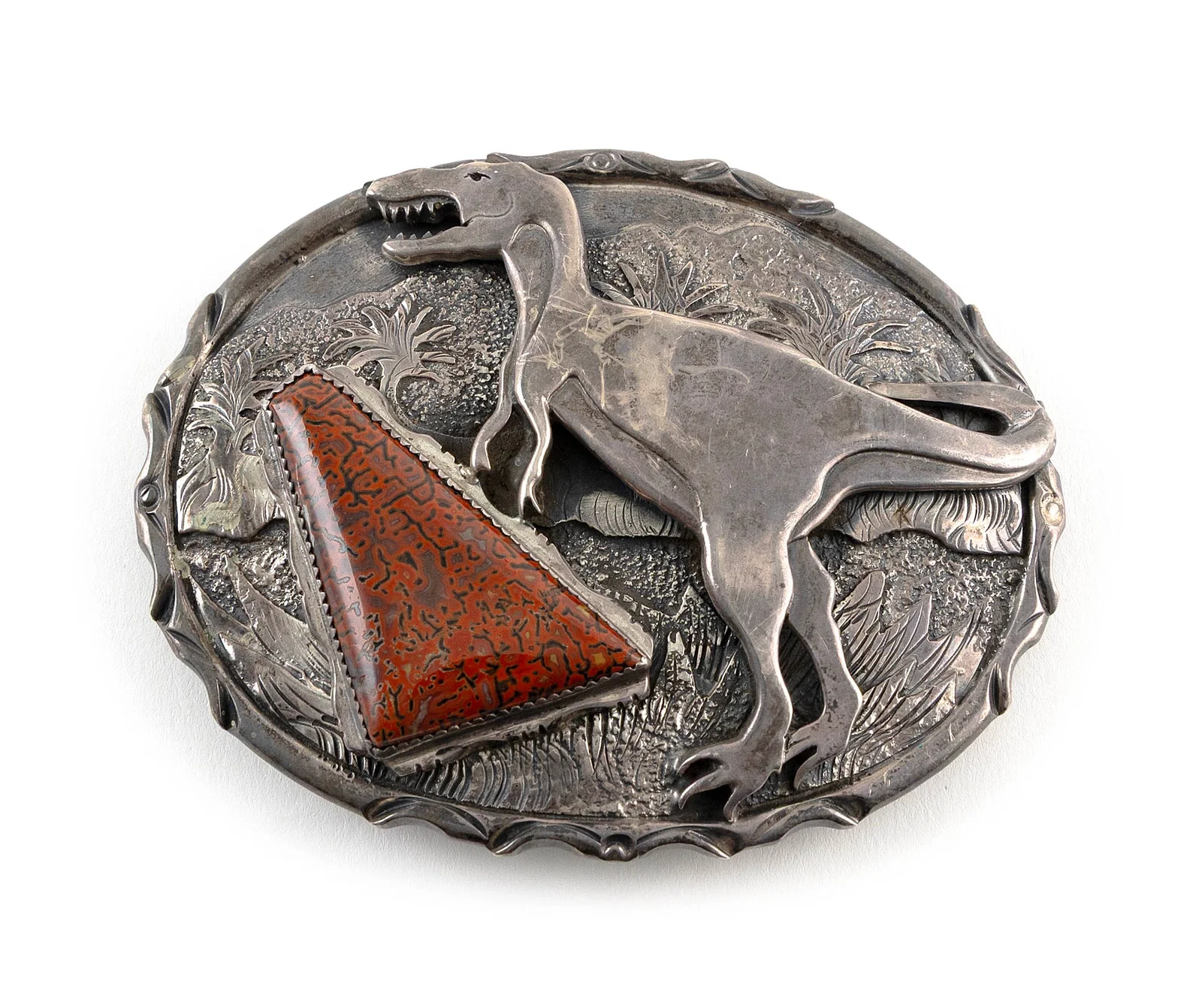 DAN NIETO NAVAJO STERLING SILVER AND RED AGATIZED DINOSAUR BONE BELT BUCKLE Late 20th Century