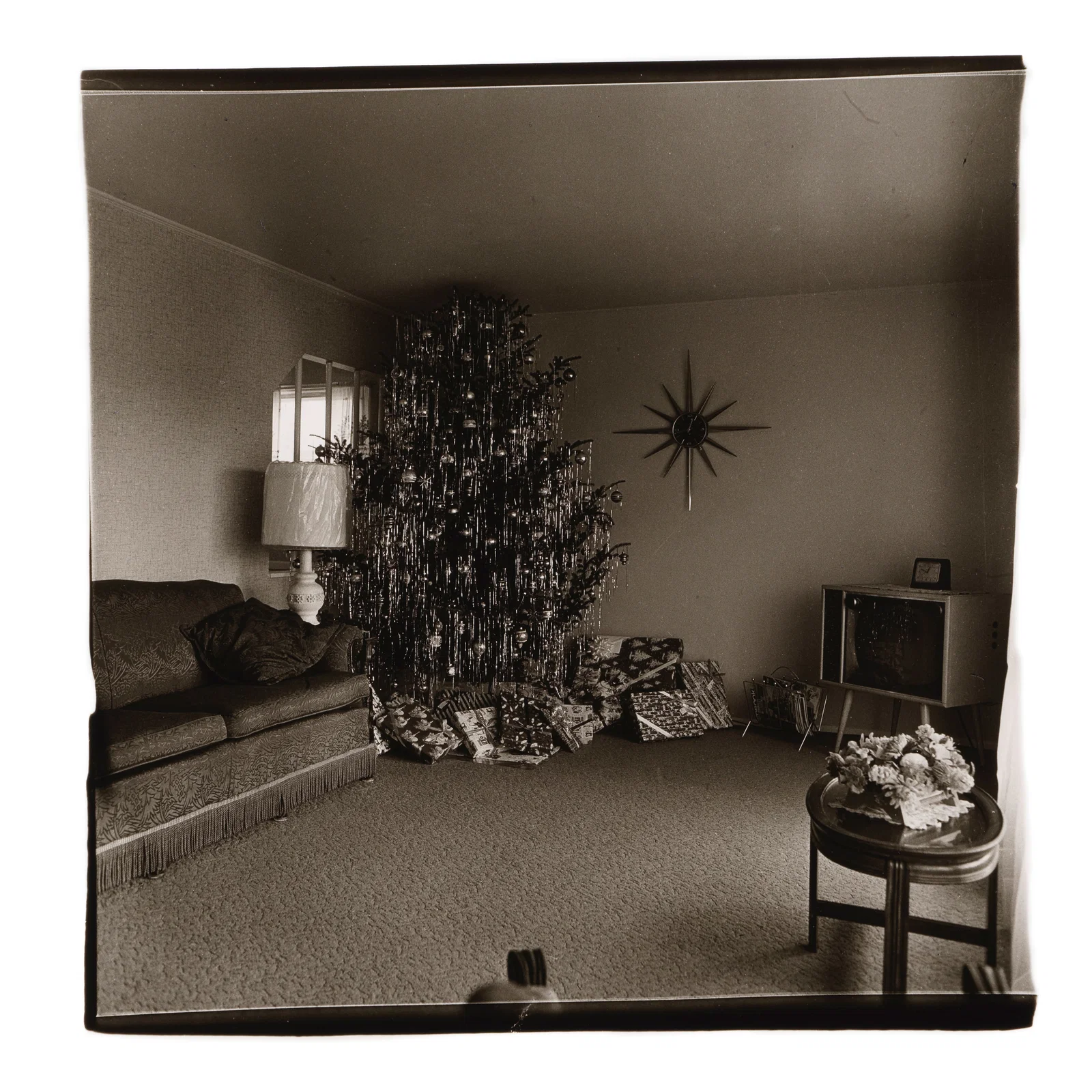 Diane Arbus (1923-1971); 'Parlor, Xmas, Levittown' (Xmas tree in a living room in Levittown, L.I.);