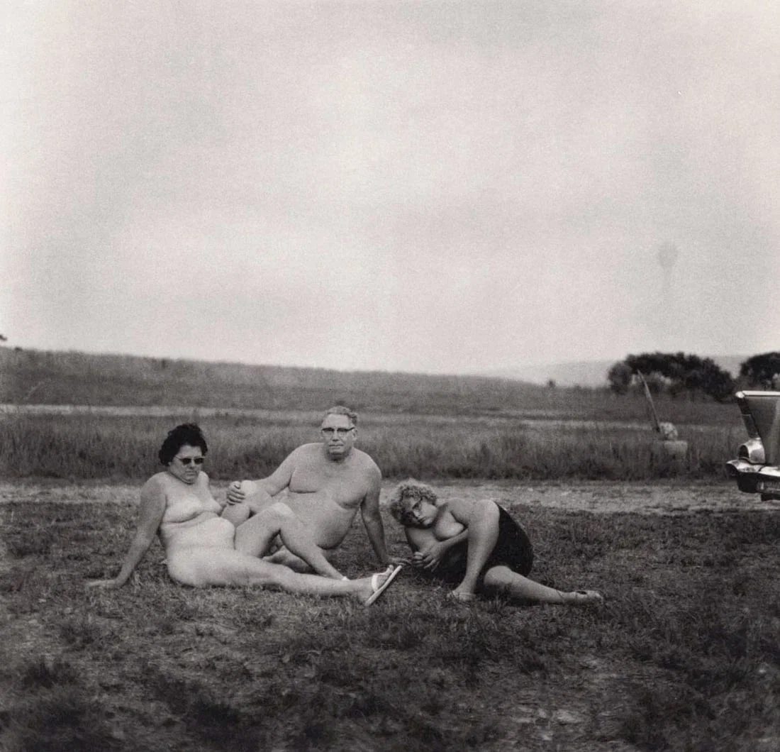 DIANE ARBUS - A Family one evening in a Nudist camp, PA. 1965