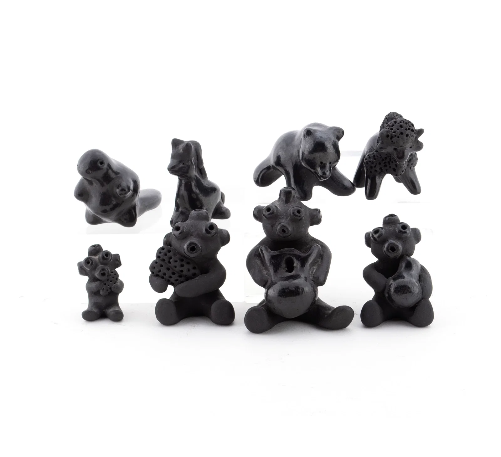 EIGHT SANTA CLARA BLACKWARE FIGURINES BY DOROTHY AND PAUL GUTIERREZ