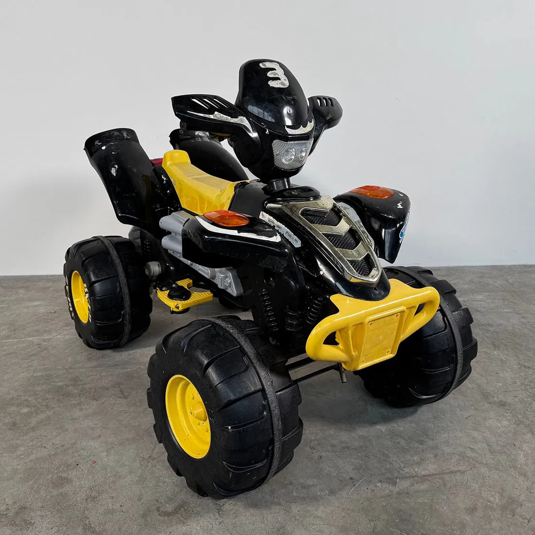 Electric Kids Quad Bike - Fully Working Condition Black and yellow ( this one has a charger)