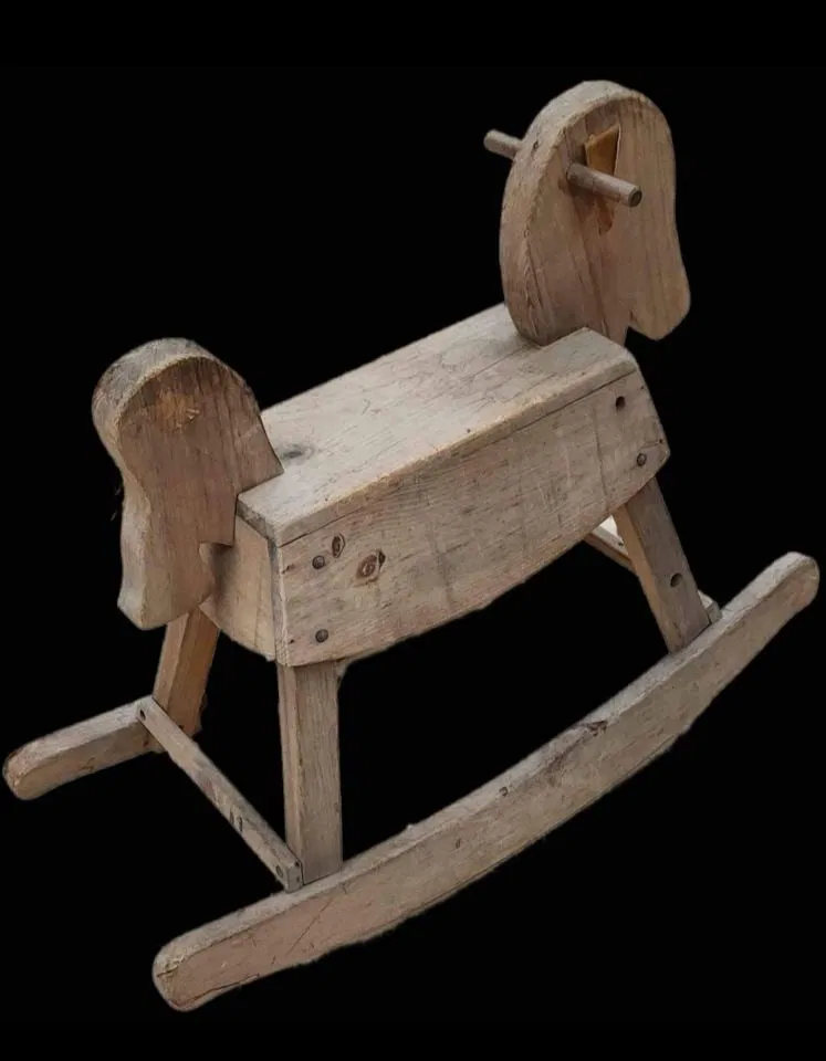 Folk Art at its Best. Antique handmade minlimalist-style primitive wooden Rocking Horse
