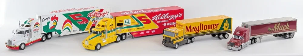 Franklin Mint Mack Semi Truck, Mayflower Semi Truck, and Kellog's Racing Trucks