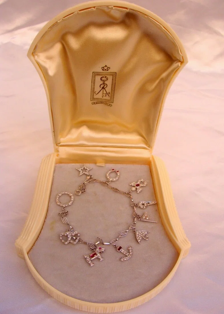 French Art Deco Platinum Diamond Ruby Charm Bracelet with 10 Charms