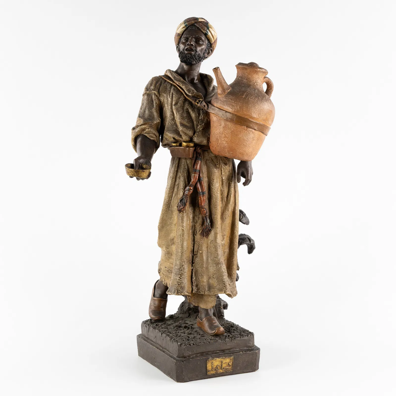 Friedrich Goldscheider (1845-1897) 'Moorish Salesman', patinated terracotta.