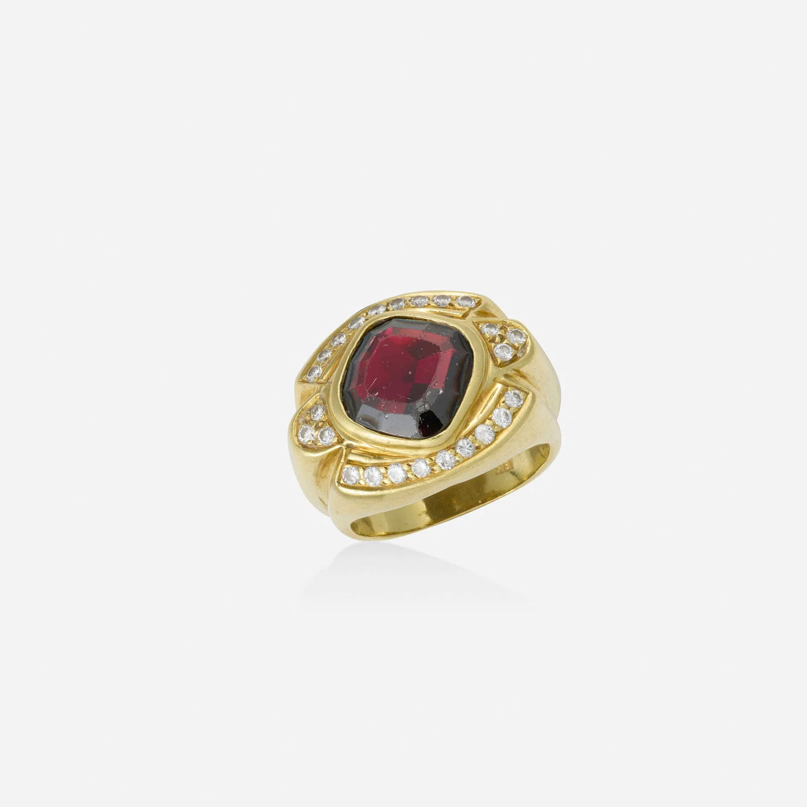 Garnet, diamond, and gold ring