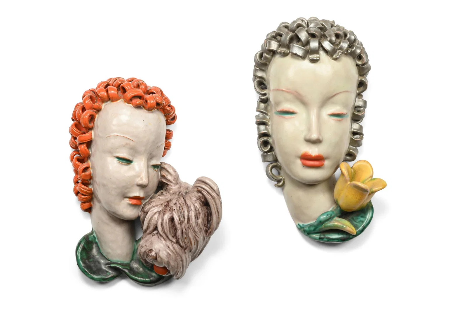 GOLDSCHEIDER (AUSTRIAN), TWO ART DECO WALL MASKS, CIRCA 1935