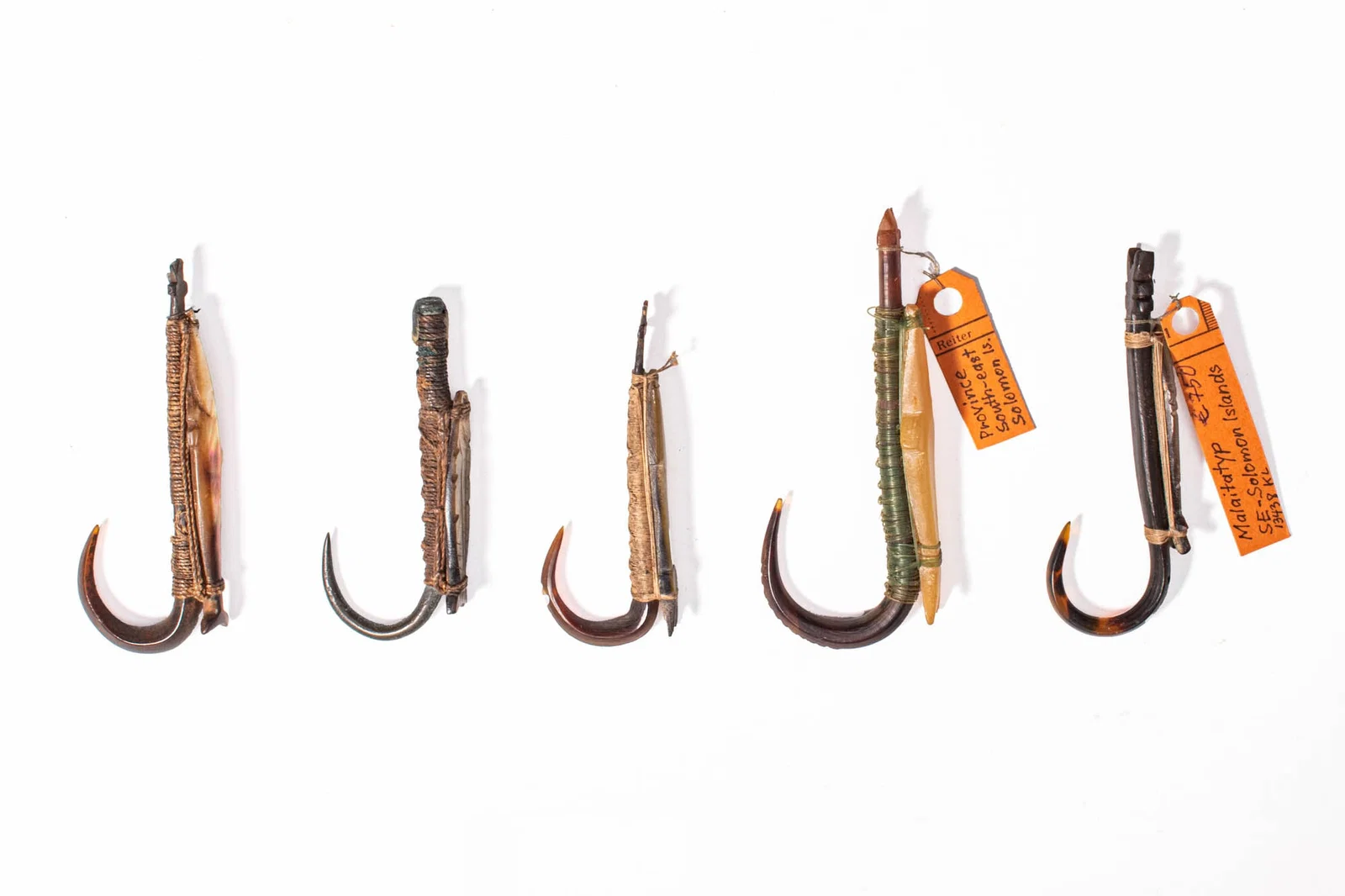 GROUP OF MALAITA FISH HOOKS