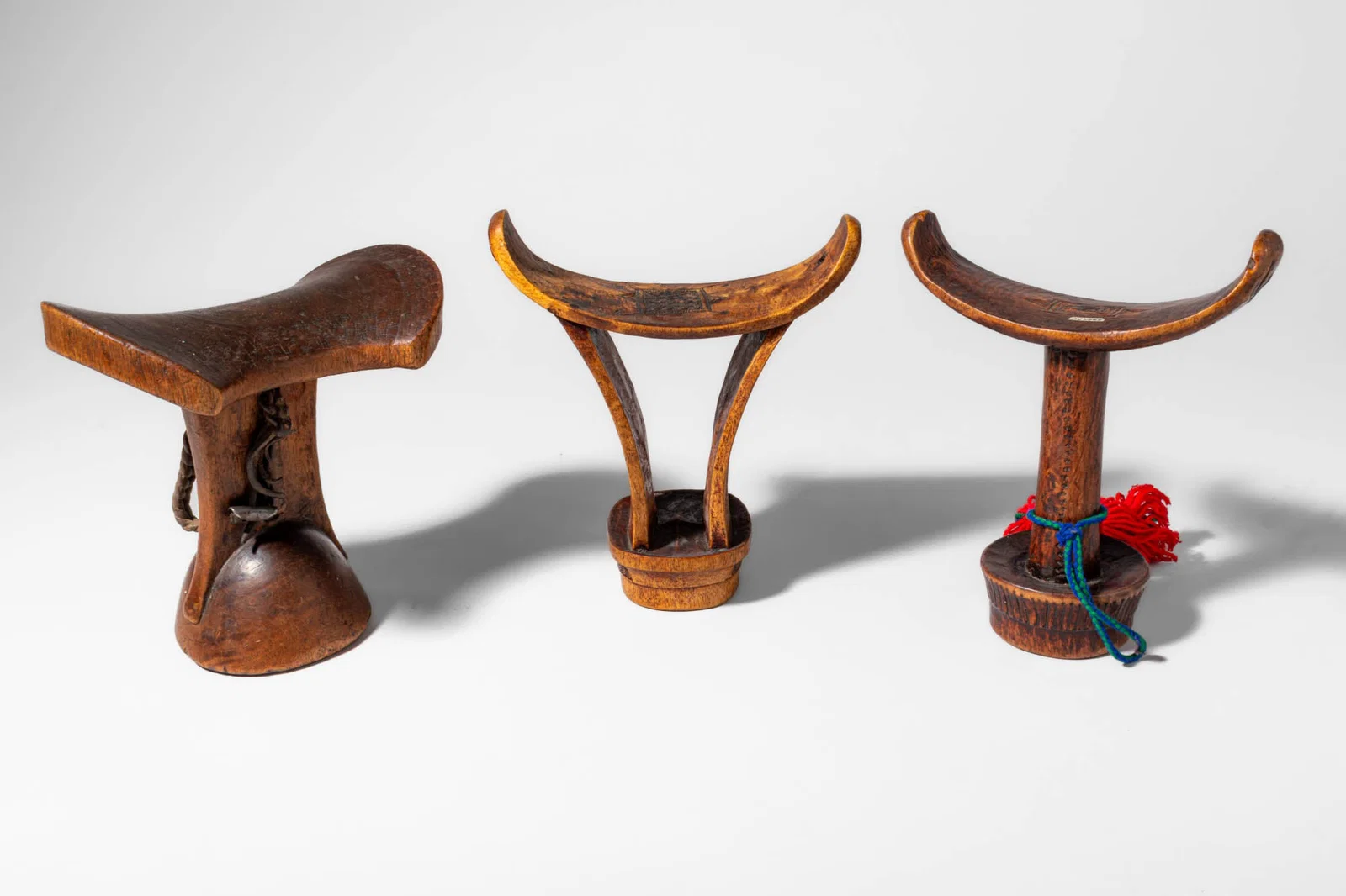 GROUP OF THREE AFRICAN HEADRESTS