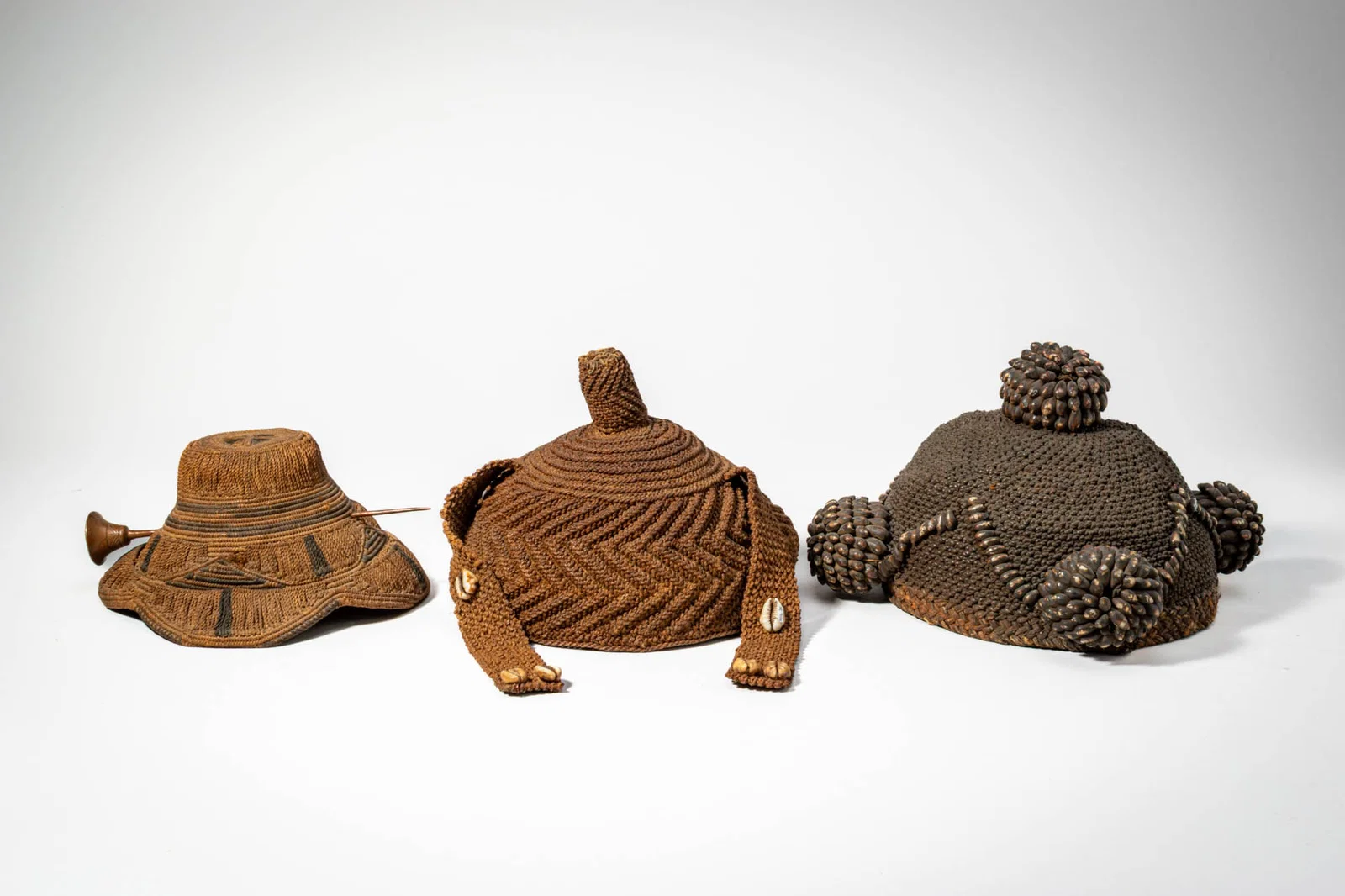 GROUP OF THREE KUBA HATS
