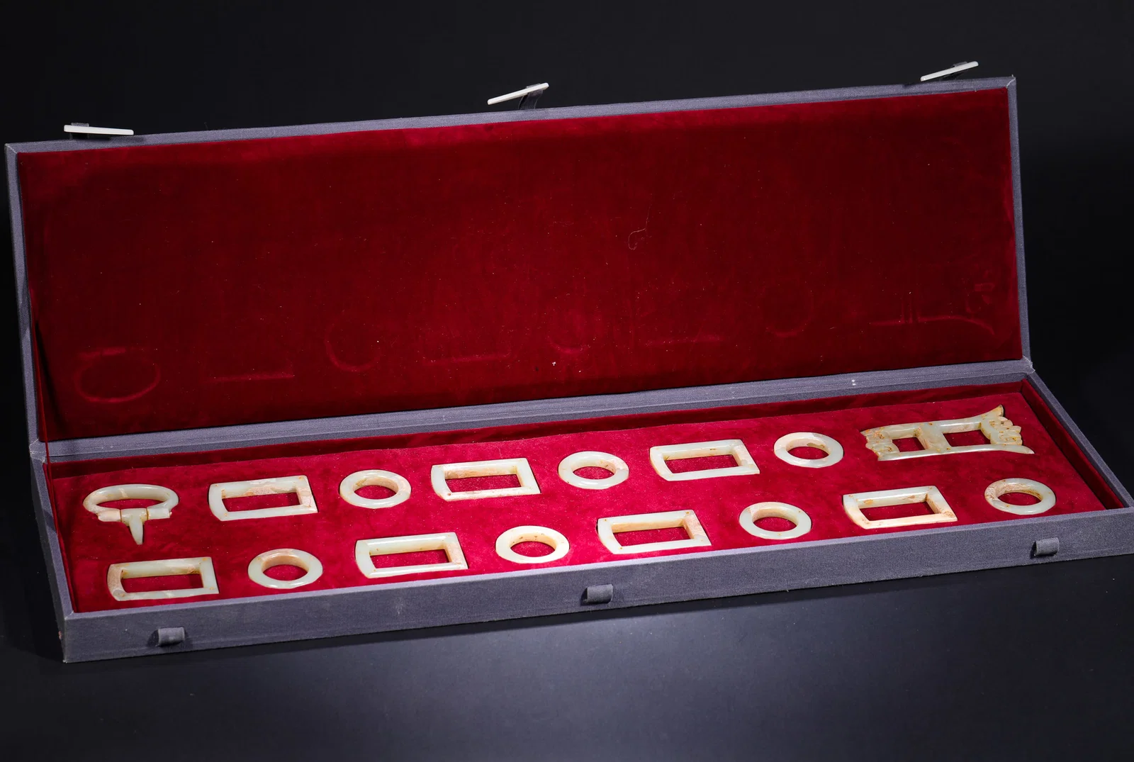 HAN DYNASTY JADE BELT HOOK AND JADE SWORD ORNAMENT SET