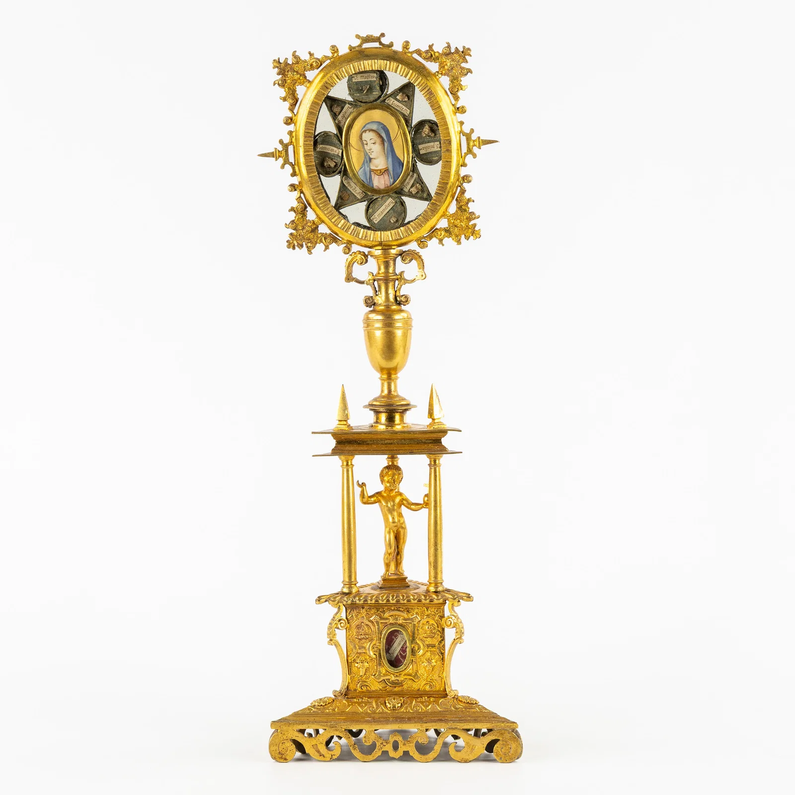 Haute époque, an exceptional gilded bronze reliquary with relics of Apostles and Saints, Spain,