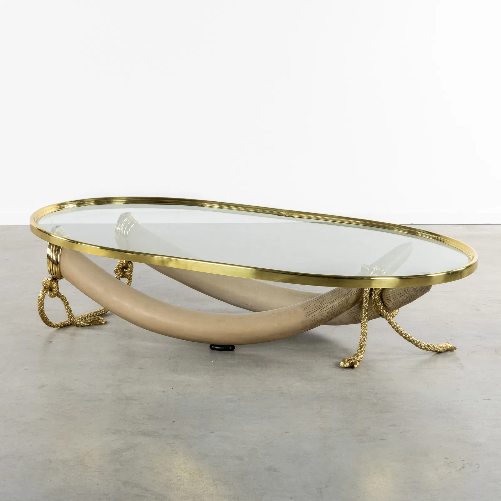 Italo Valenti (1912-1995) for Valenti, A Coffee Table with Faux Elephant Tusks. Spain, circa 1970.