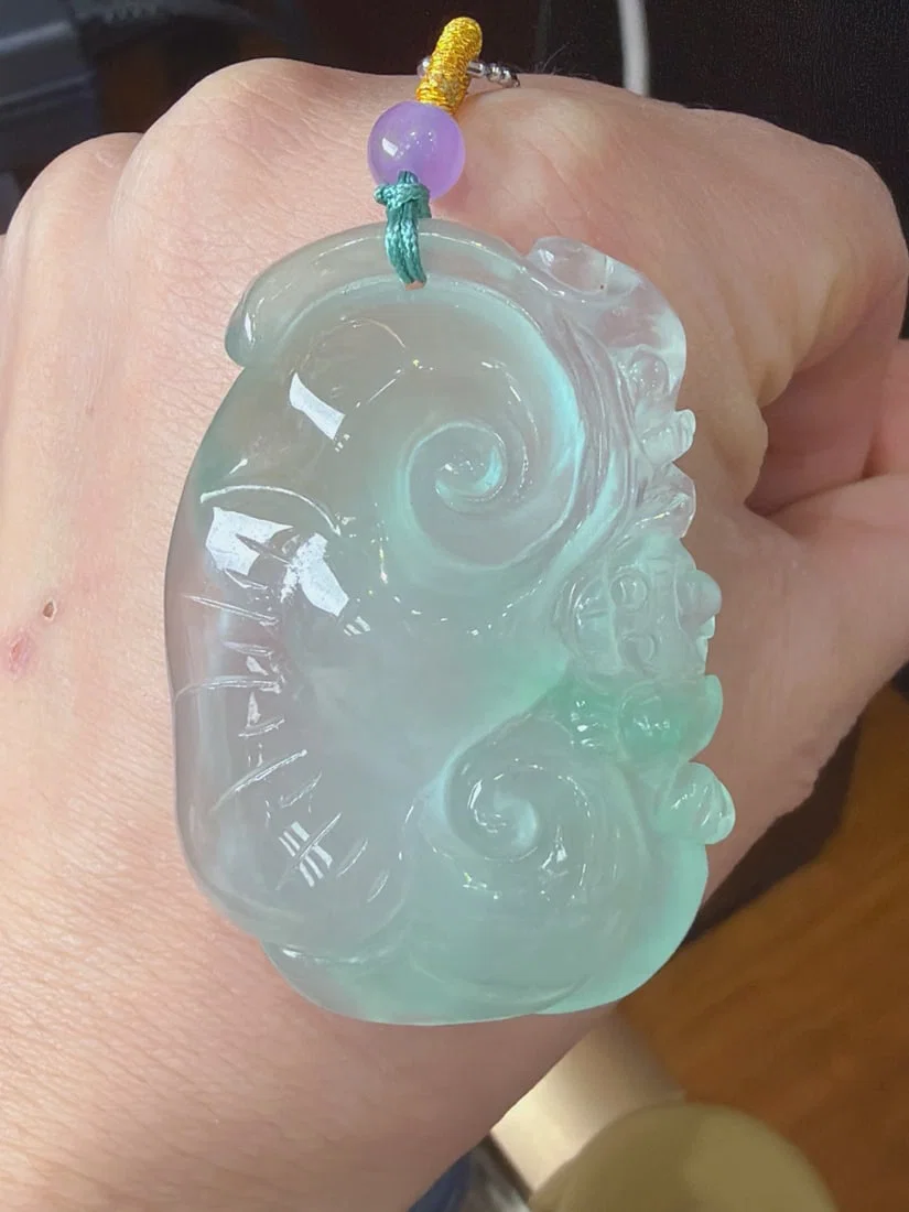 Jadeite Icy Type with Floating Flower Pattern Ruyi
