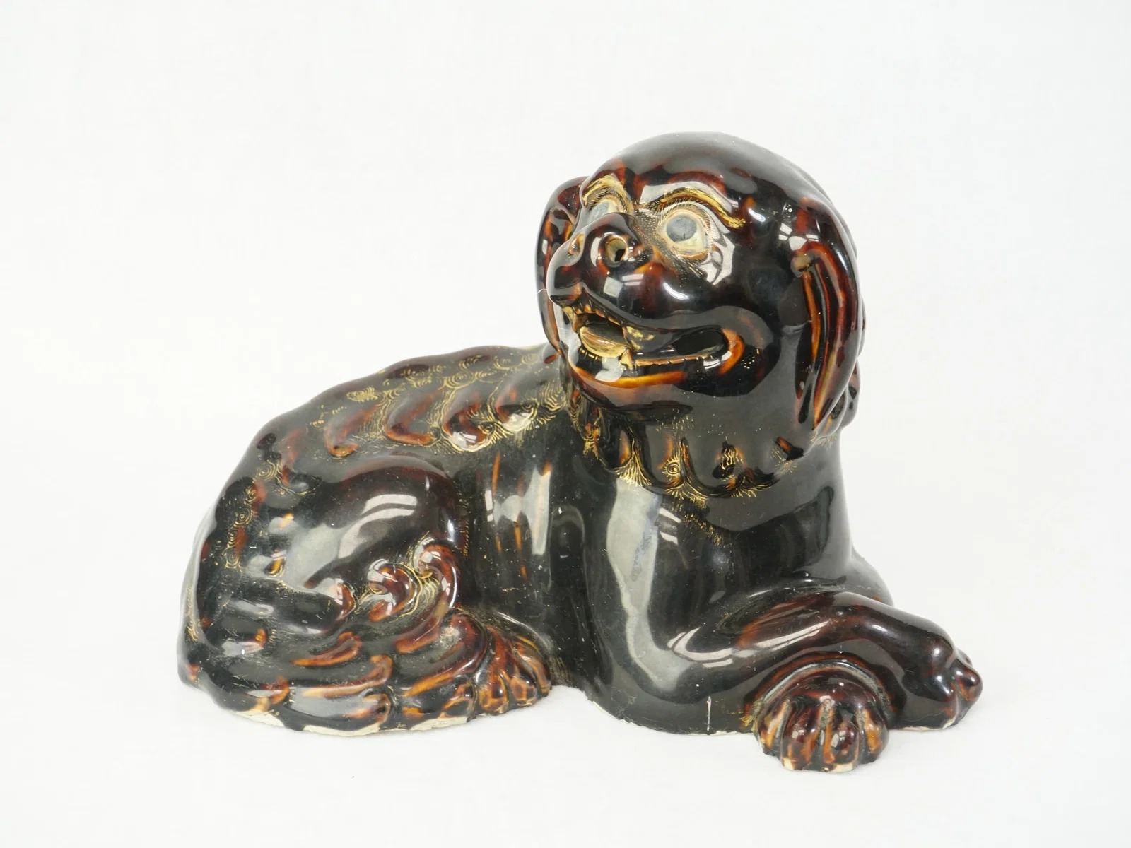Japanese Black-Glazed and Gilt Porcelain Foo Dog