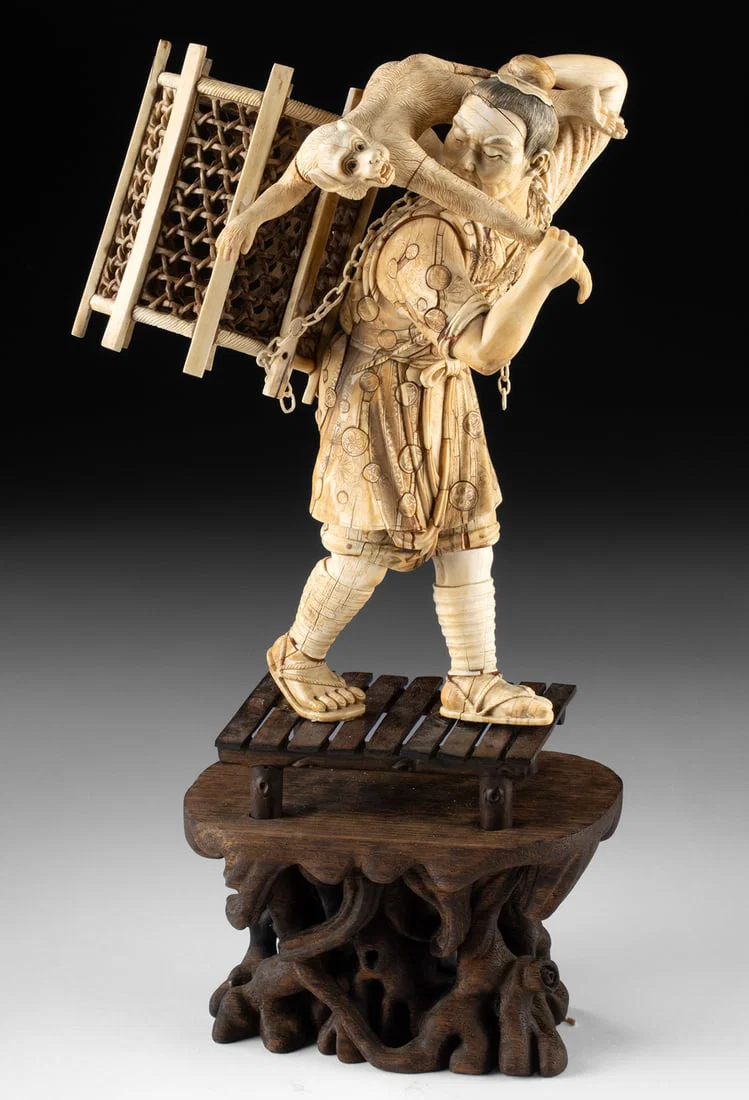 Japanese Ivory Okimono - Man with Monkey by Tadamori