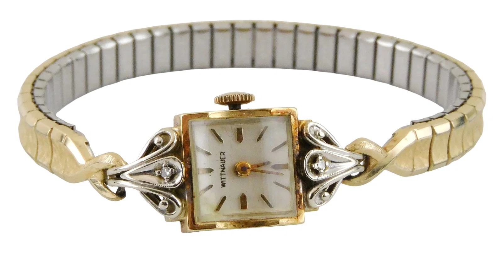 JEWELRY: 14K Wittnauer gold women's wristwatch, stamped "14K", square case, set with two white