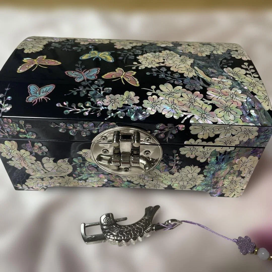 Korean lacquer storage box, decorated with butterfly and floral motifs.