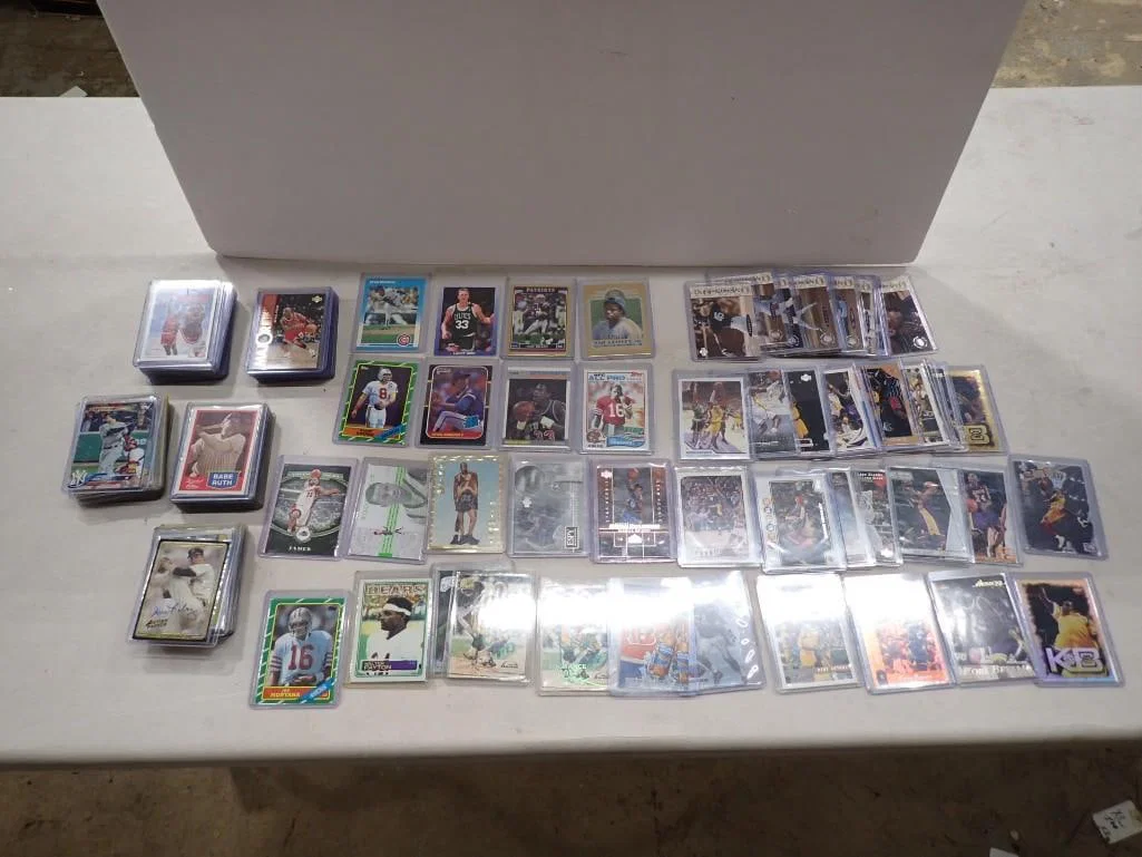 Large Lot of assorted Sports Cards including Greg Maddux Rookie, Michael Jordan, Larry Bird, Steve Y