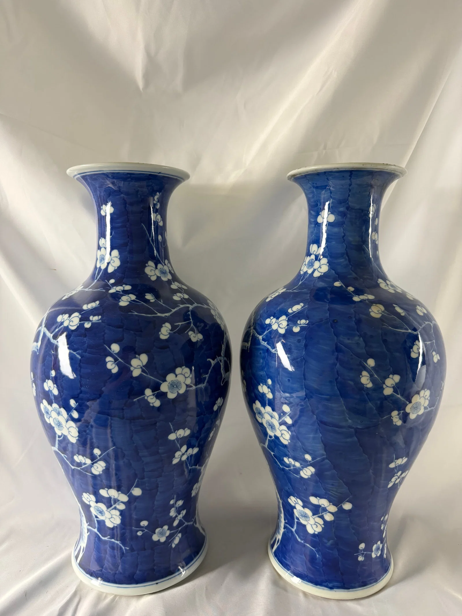 Large pair of Chinese blue and white plum blossom porcelain vases