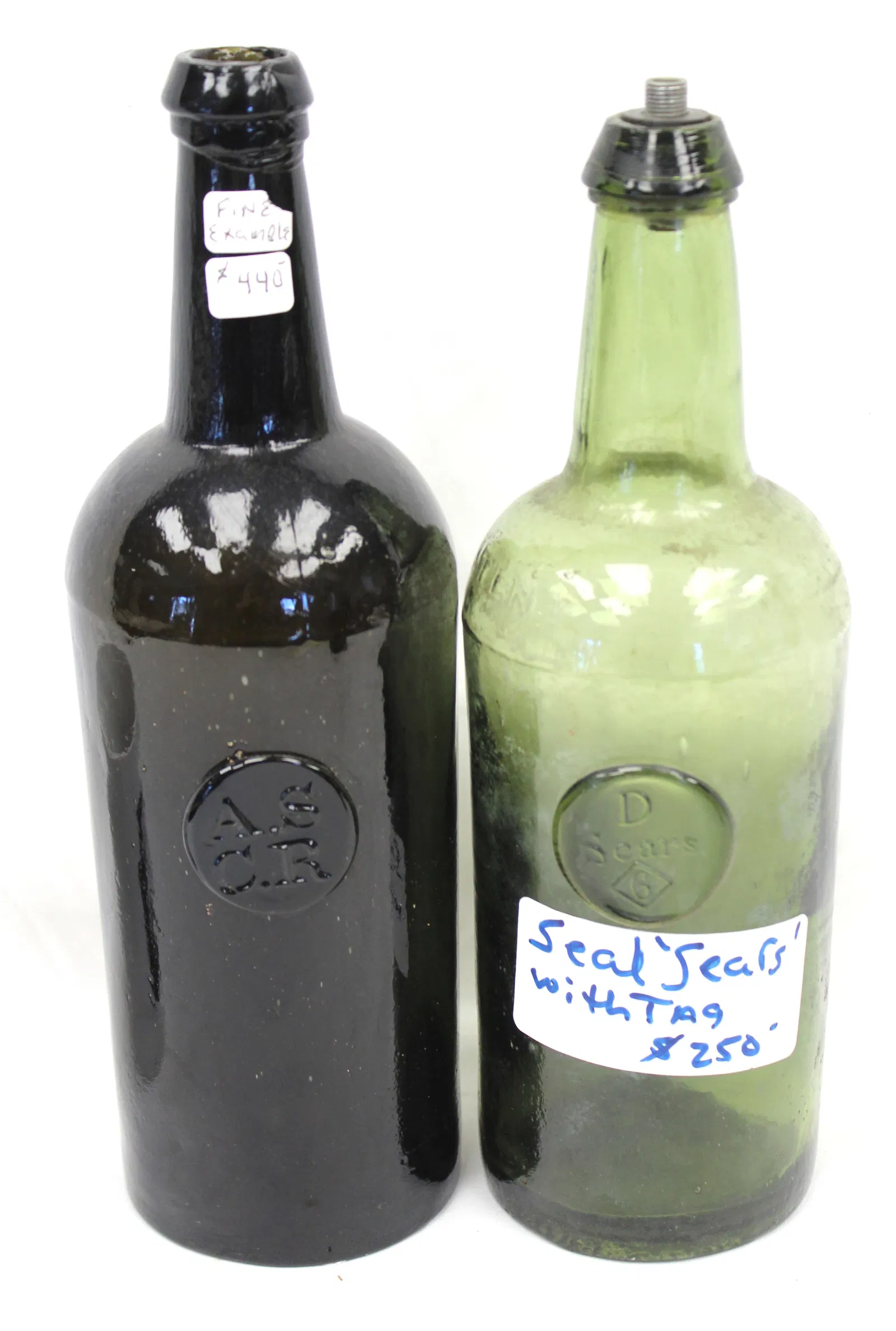 Lot of 2 early bottles w seals in green & deep olive - 10 1/2" & 11" tall