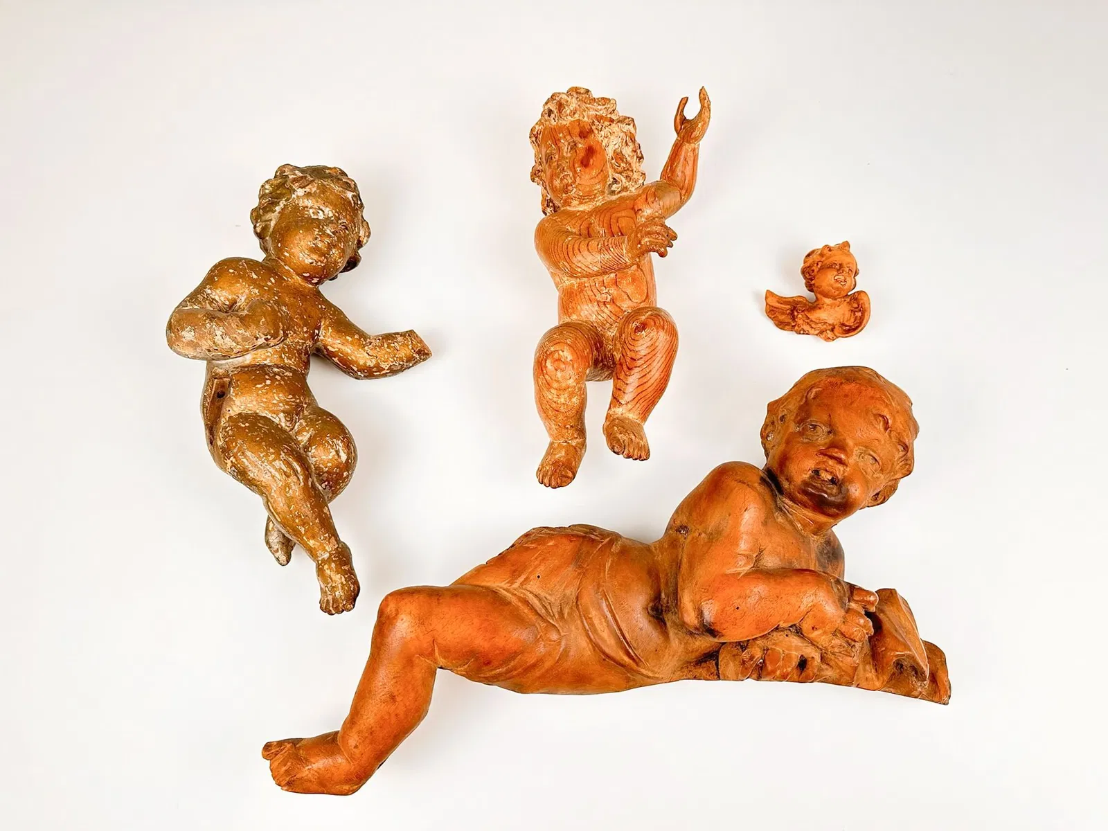 Lot of Four Vintage Carved Wooden Cherubs
