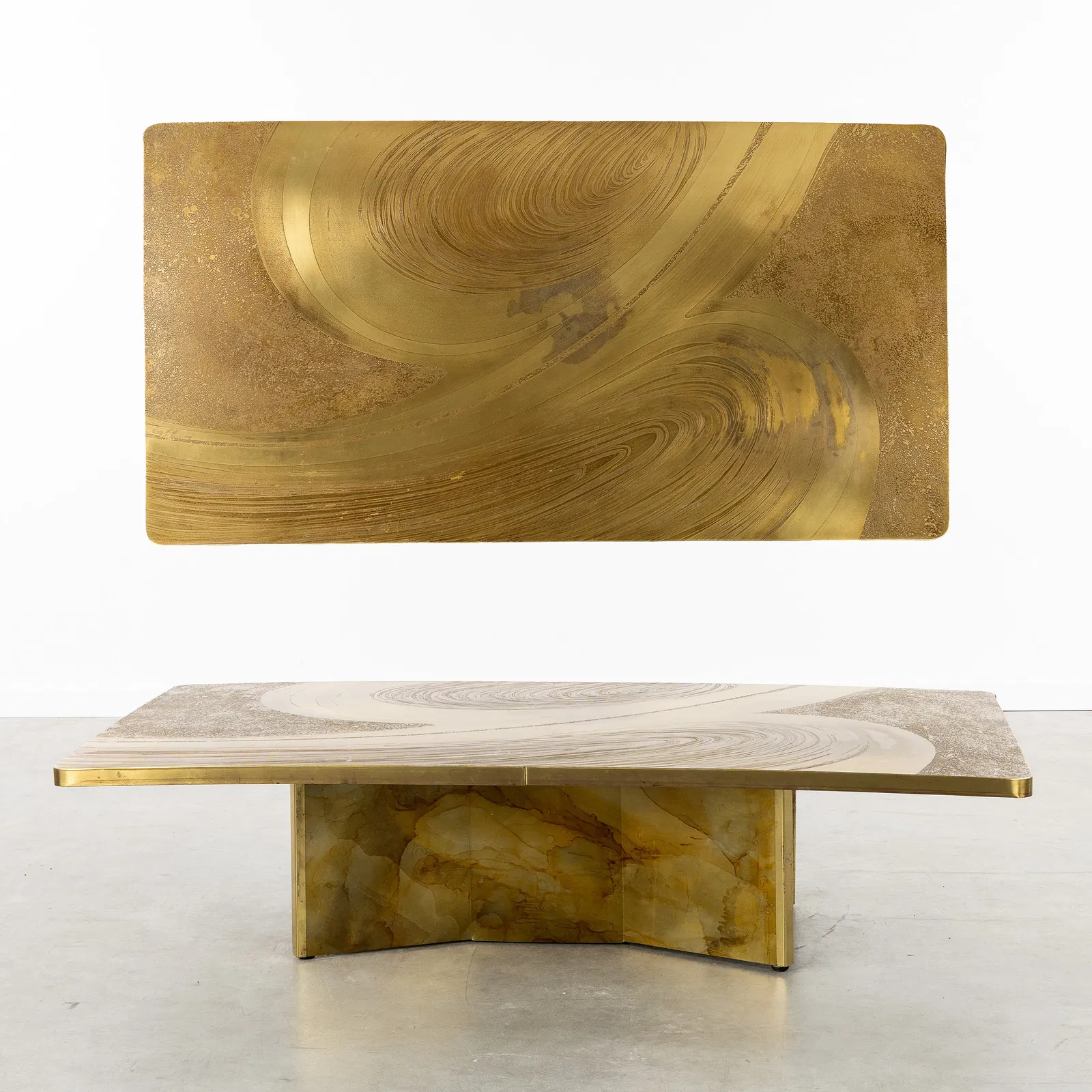 Marc D'haenens (XX) a coffee table, engraved and etched brass, circa 1970.