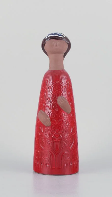 Mari Simmulson, a large unique handmade ceramic sculpture of a woman with deep red glaze.