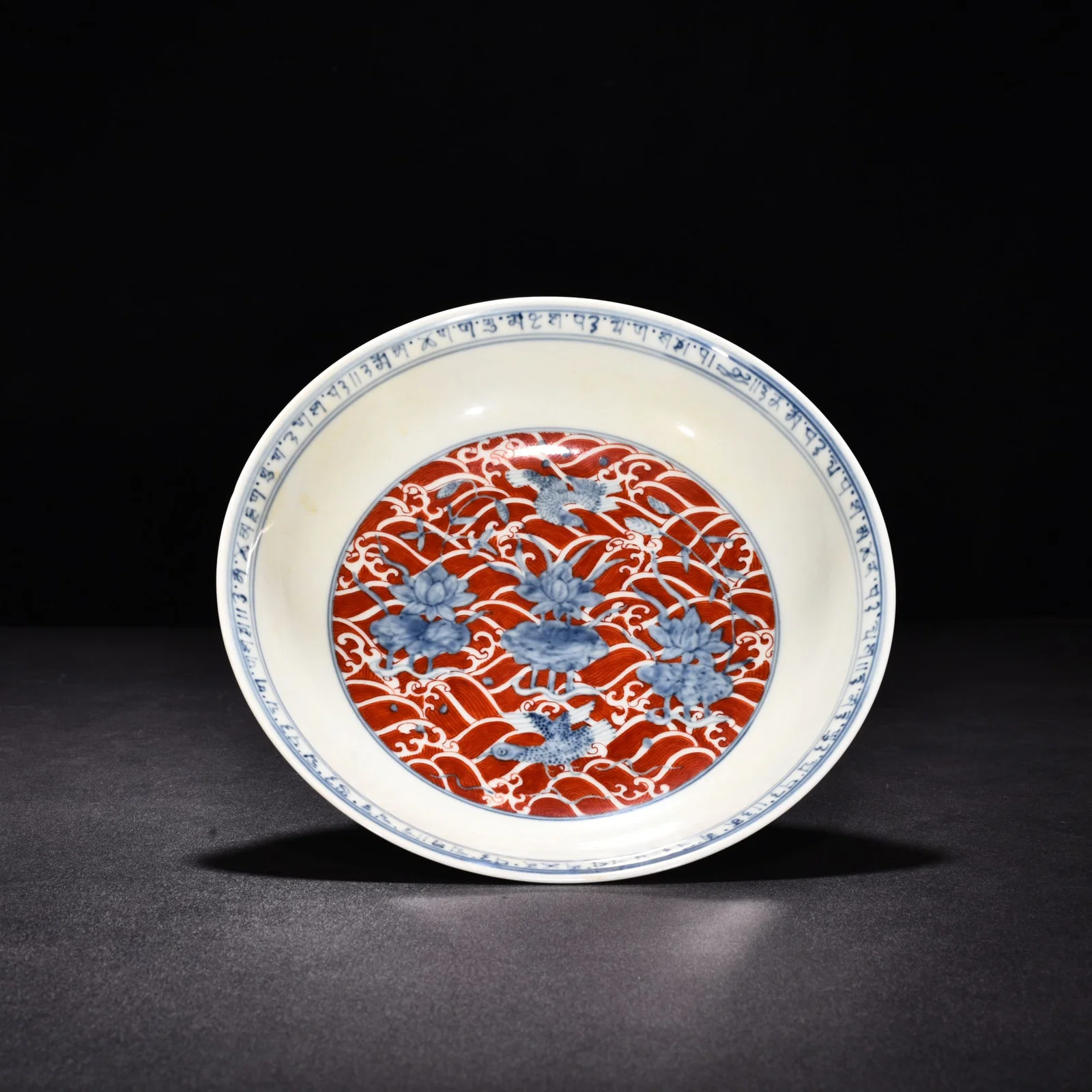 Ming Dynasty Chenghua blue and white alum red lotus pond mandarin duck Sanskrit plate