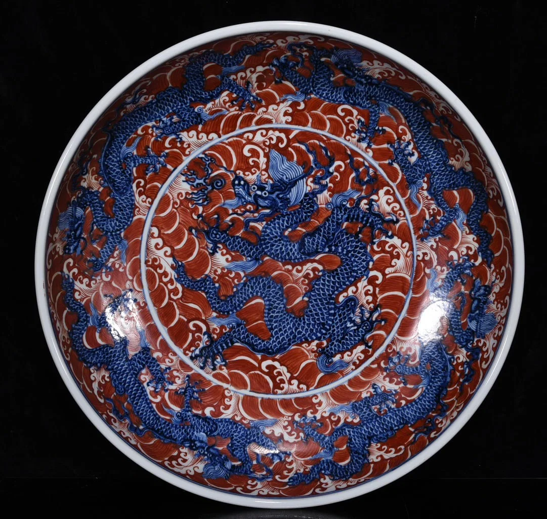 Ming Dynasty Xuande blue and white alum red dragon plate