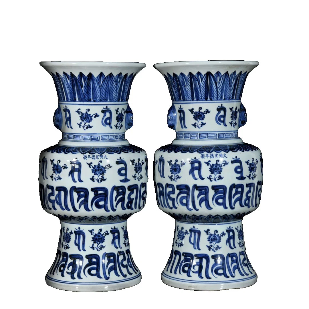 Ming Dynasty Xuande blue and white floral Sanskrit beast head flowerpot pair